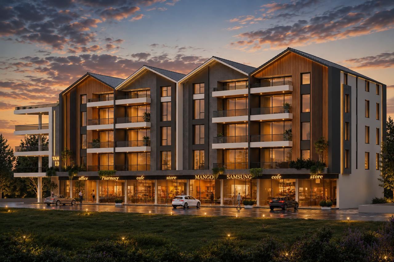 TAAN 13 at dusk: pitched roofs, timber-clad façade and lit balconies above a ground-floor commercial frontage
